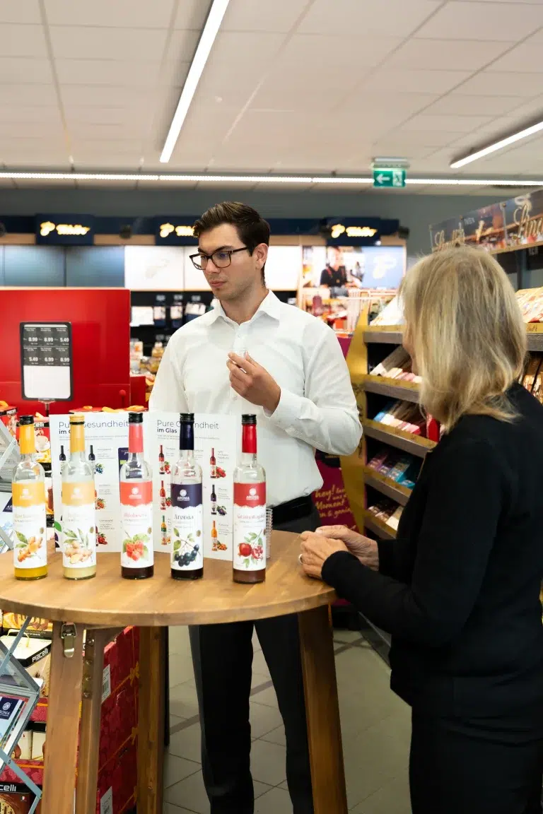 Prezentarea sucurilor Aronia Charlottenburg la masa de degustare, München 2026